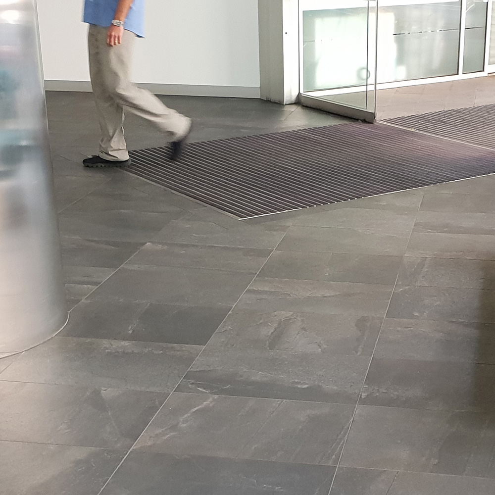 Entry Mat with a man walking