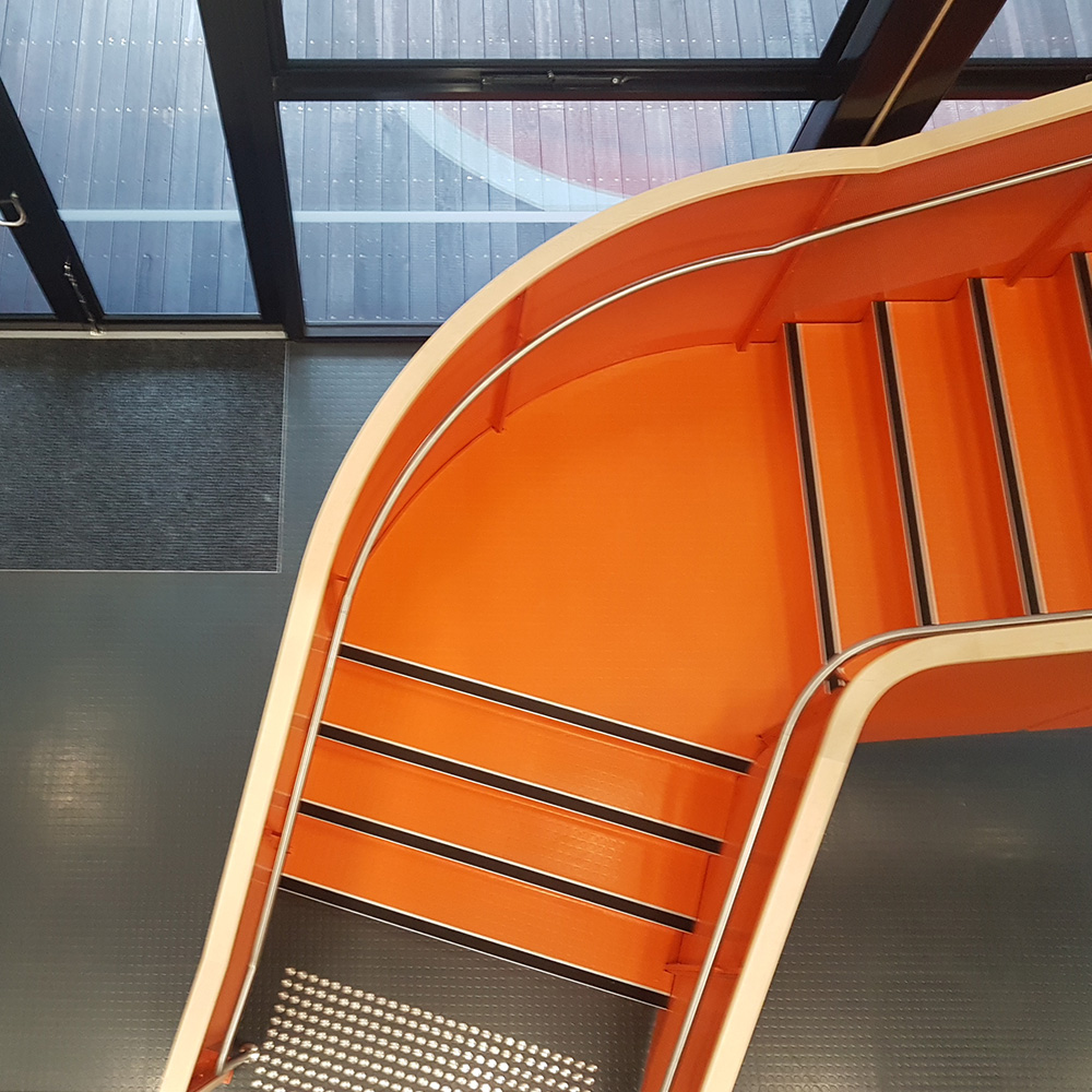 Stairs with orange rubber floor
